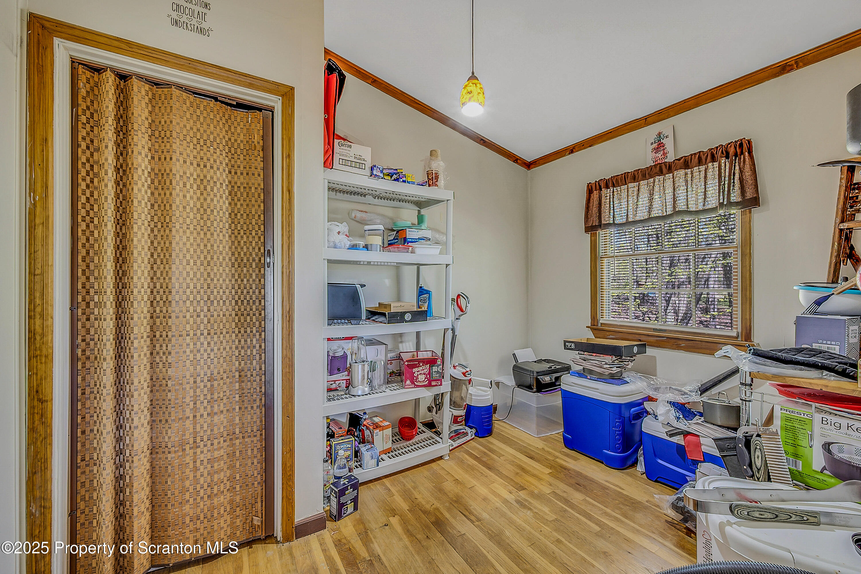 106 Lookout Drive Hawley, PA 18428 - Photo 41 of 43 a storage room with stainless steel appliances wooden floor and window