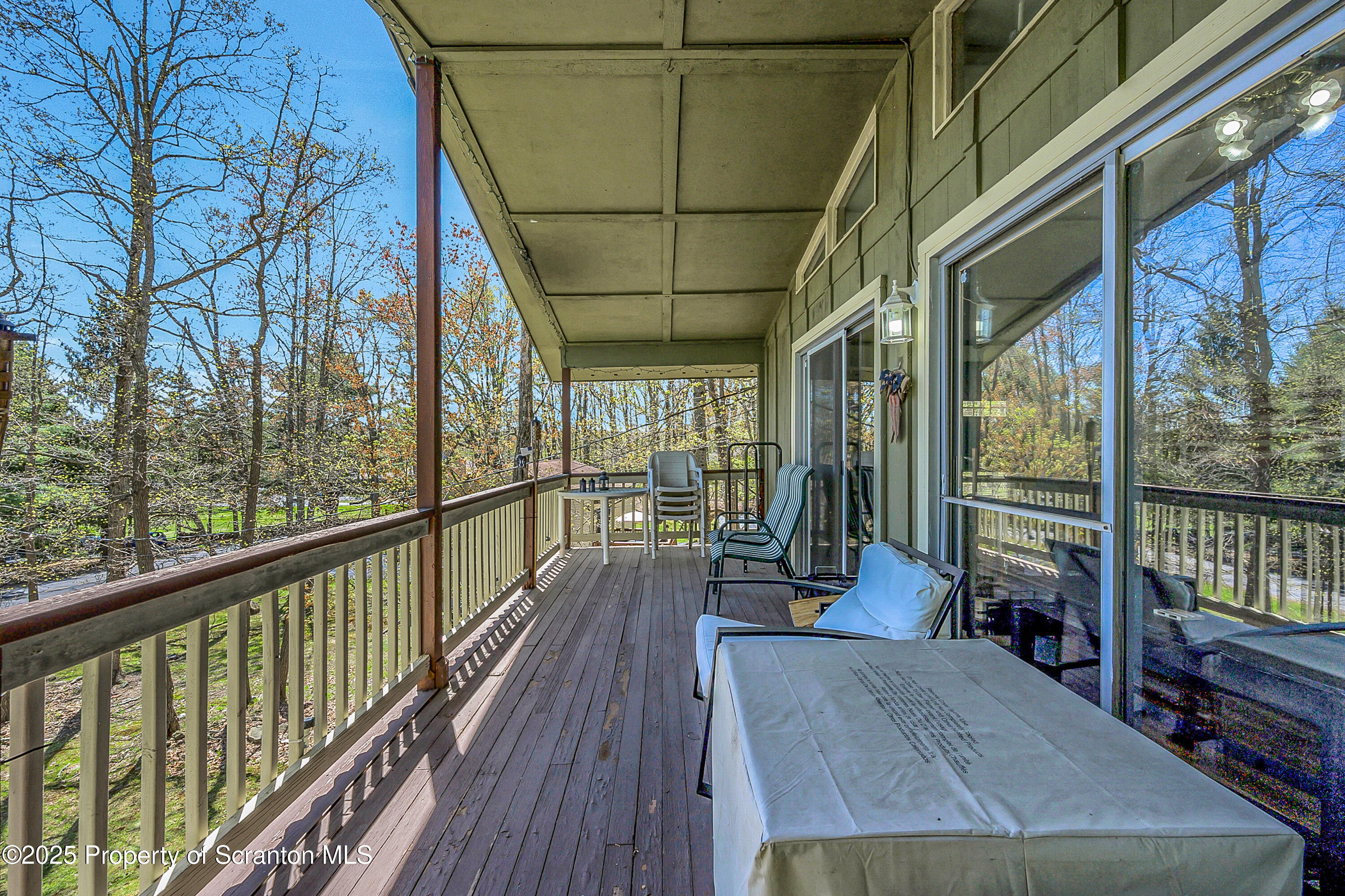 106 Lookout Drive Hawley, PA 18428 - Photo 8 of 43 a view of porch with seating space