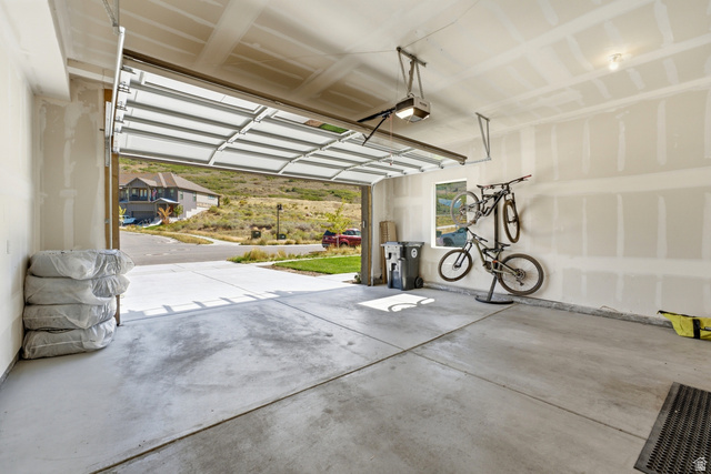 6039 North Westridge Road Heber City, UT 84032 - Photo 48 of 71 Concrete flooring, automatic garage door opener, interior window, ample wall space