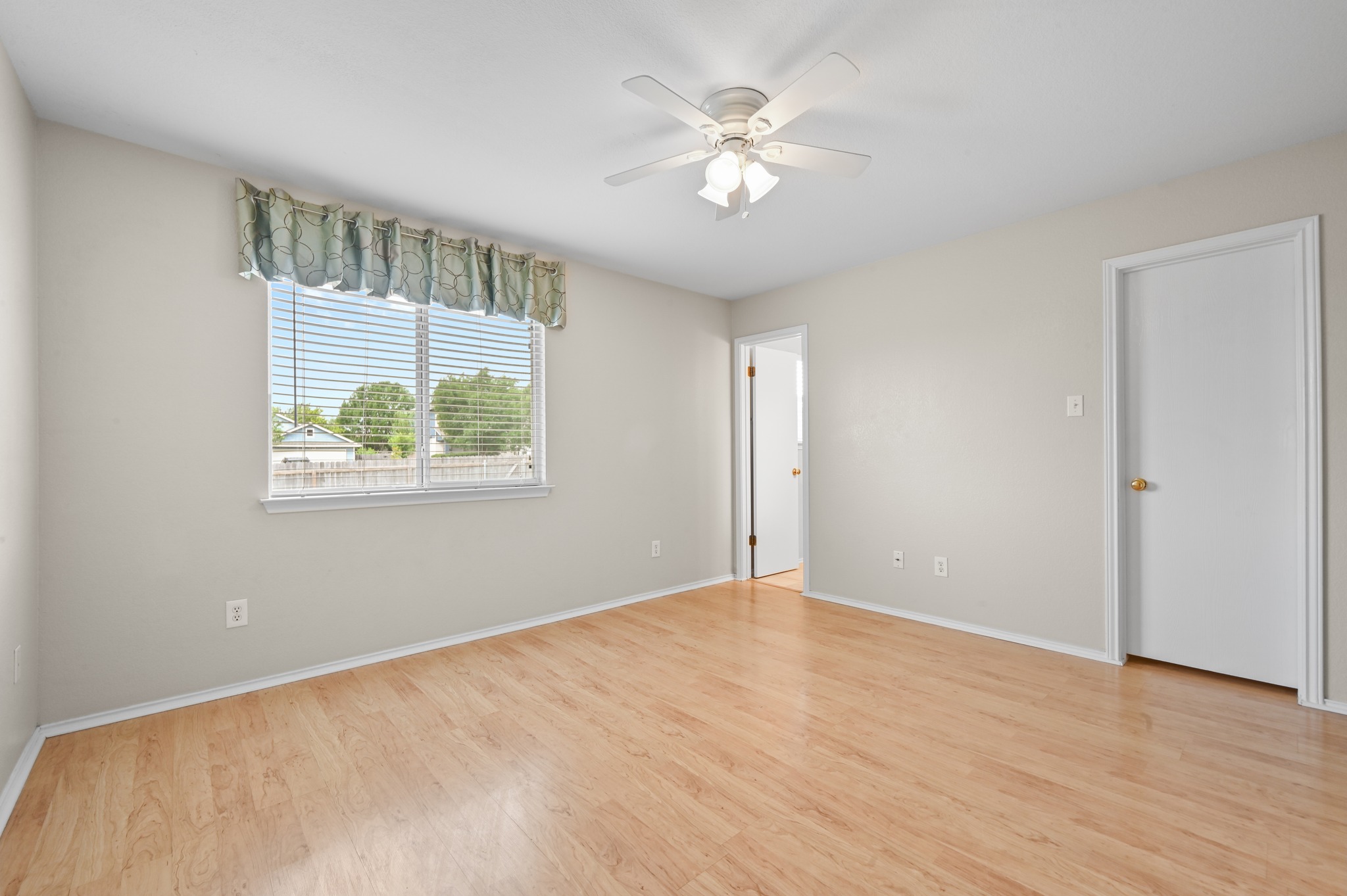 112 Mason Reed Cove Kyle, TX 78640 - Photo 14 of 26 a view of an empty room with a window
