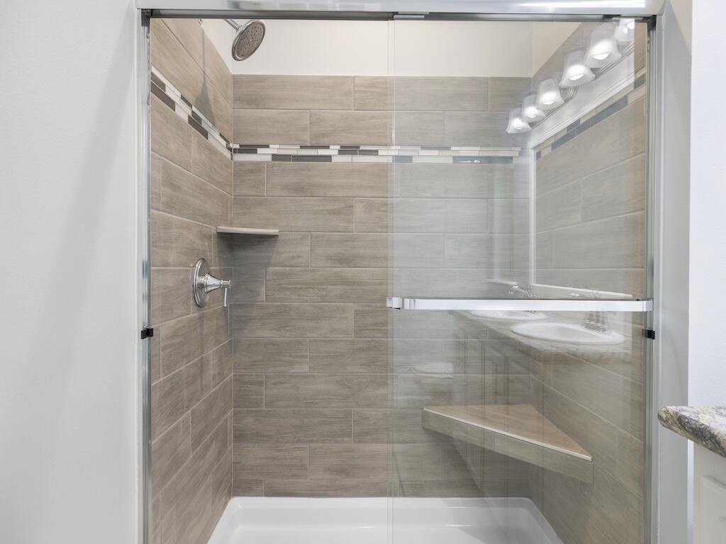 12939 North Indian River Drive, Unit 1 Sebastian, FL 32958 - Photo 25 of 46 a bathroom with a shower