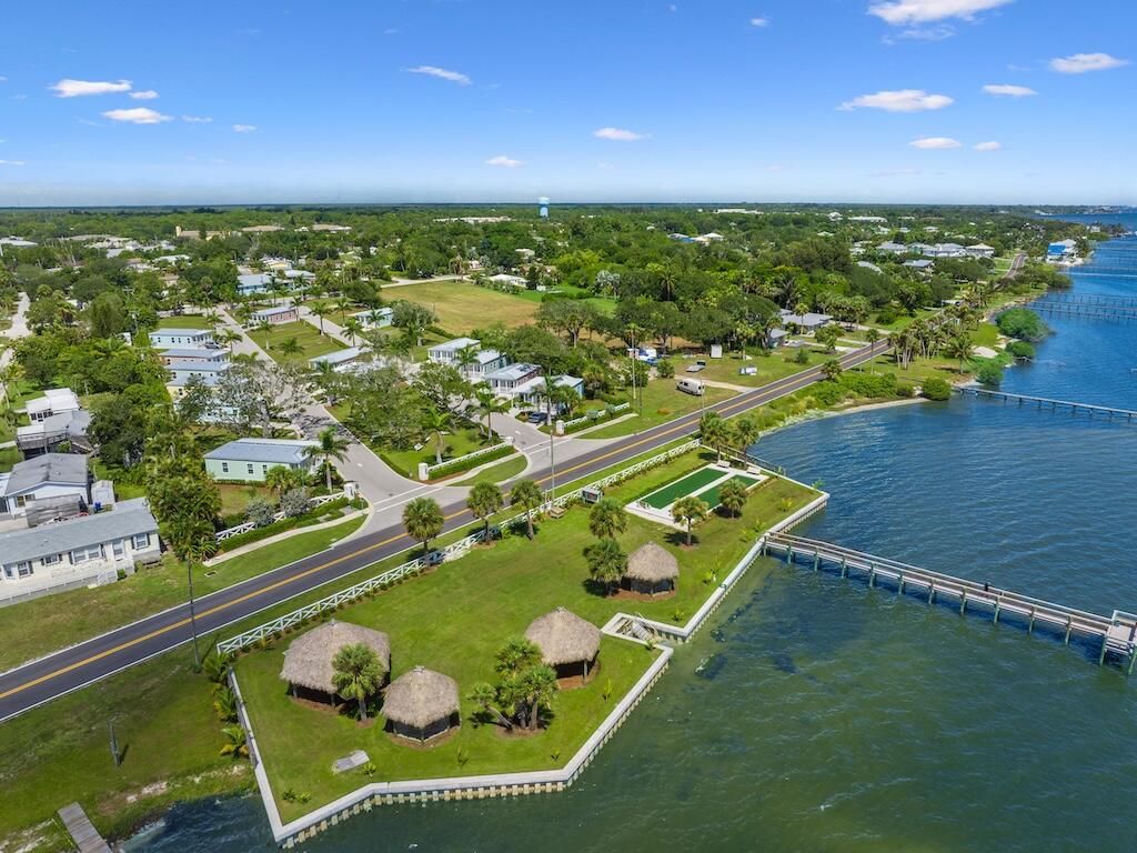 12939 North Indian River Drive, Unit 1 Sebastian, FL 32958 - Photo 30 of 46 an aerial view of a pool patio swimming pool and outdoor seating