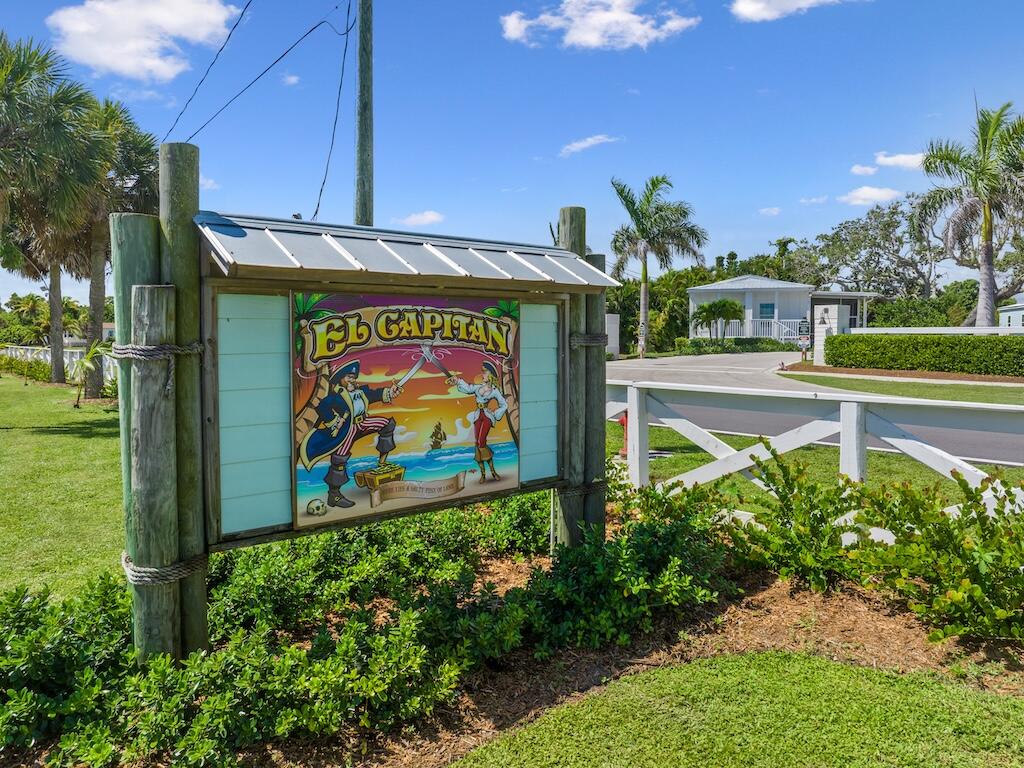 12939 North Indian River Drive, Unit 1 Sebastian, FL 32958 - Photo 40 of 46 a sign on the side of a building