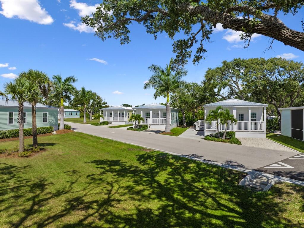 12939 North Indian River Drive, Unit 1 Sebastian, FL 32958 - Photo 44 of 46 a view of a house with garden and sitting area