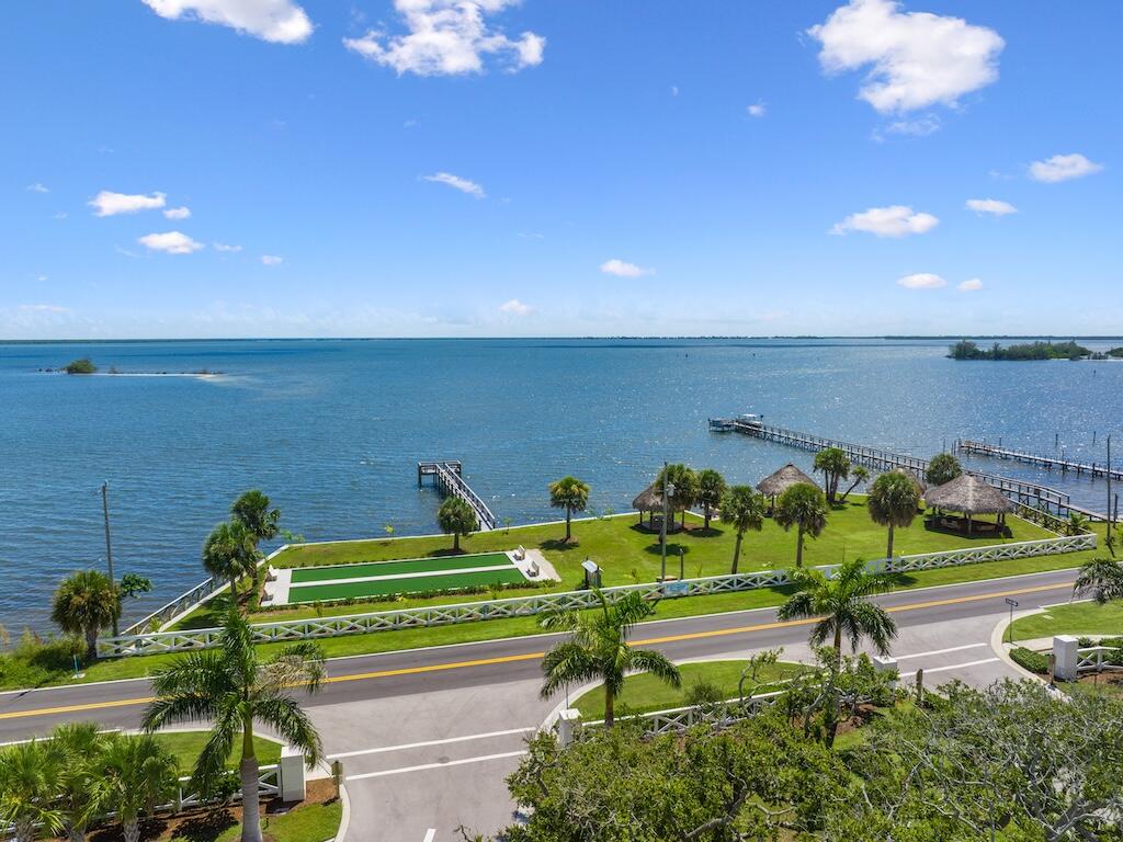 12939 North Indian River Drive, Unit 1 Sebastian, FL 32958 - Photo 45 of 46 a green field with lots of flower plants in it