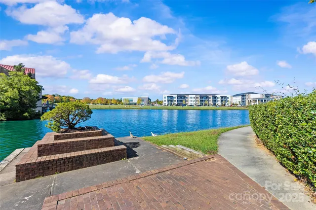 a view of a lake with a yard