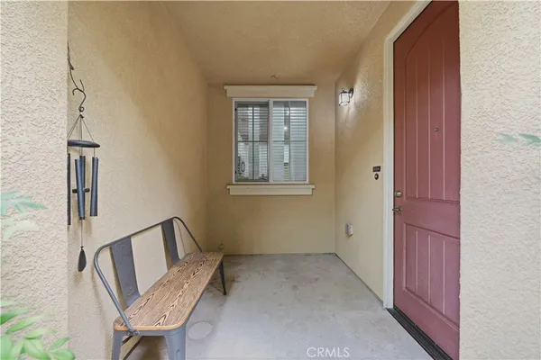 a view of an empty room with windows