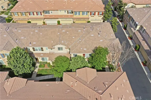 a view of a street with big houses