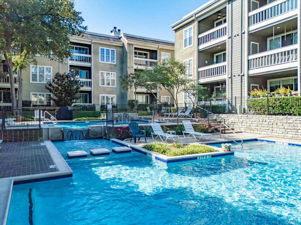 Community pool with a patio area