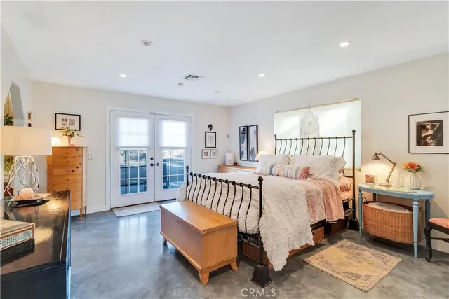 a bedroom with furniture and a couch