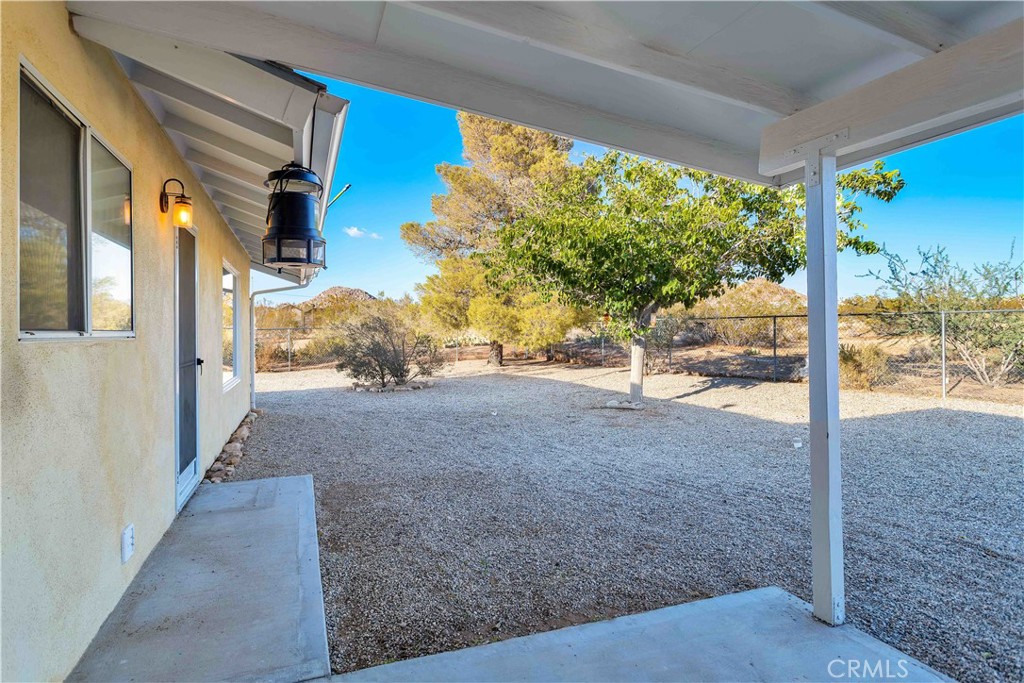8775 Desert Shadow Road Joshua Tree, CA 92252 - Photo 30 of 39 a view of a road from a balcony