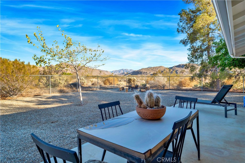 8775 Desert Shadow Road Joshua Tree, CA 92252 - Photo 31 of 39 a view of an outdoor seating area