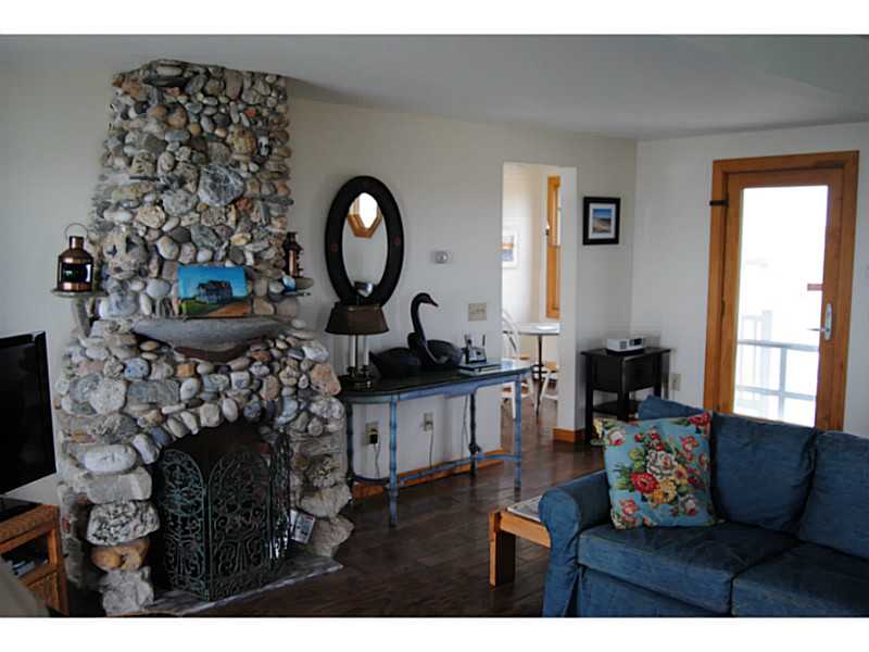 1119 Snake Hole Road Block Island, RI 02807 - Photo 8 of 17 Other. beach stone gas fireplace