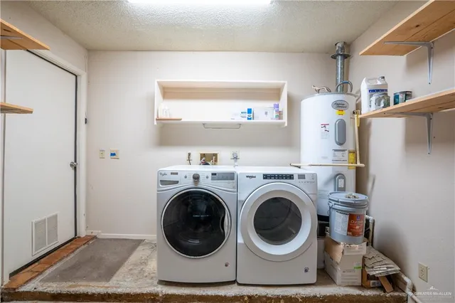 a view of living room with washer and dryer