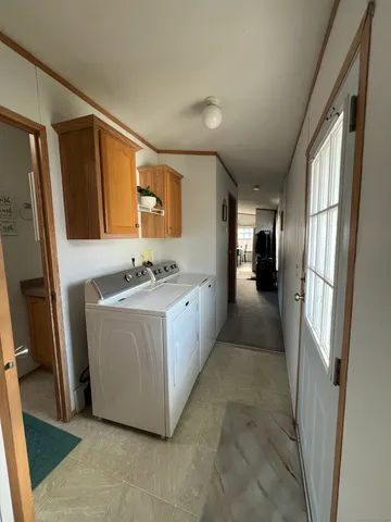 a bathroom with a sink a mirror and a bathtub