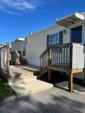 a view of balcony with furniture