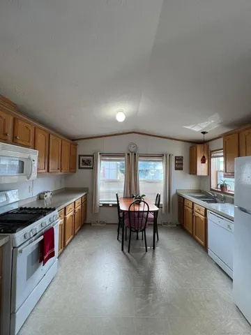 a kitchen with granite countertop lots of counter top space