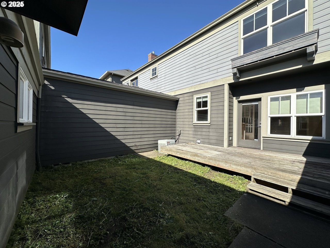 1495 Northeast Village Street Fairview, OR 97024 - Photo 16 of 16 a view of backyard with deck