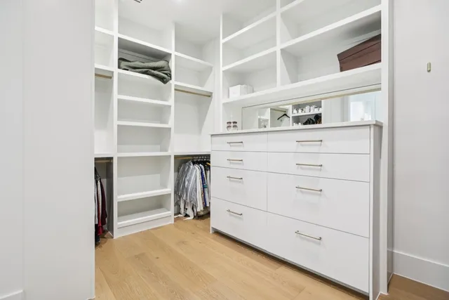 a view of an empty walk in closet