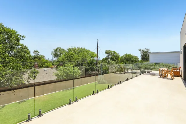 a kitchen with a stove a sink and a refrigerator
