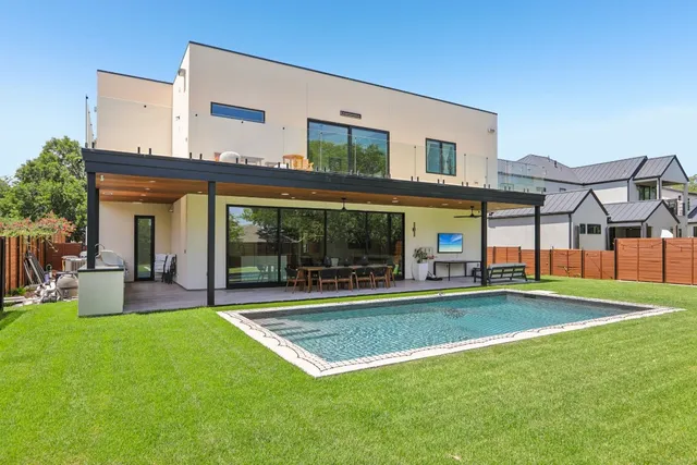 an aerial view of a house with a garden