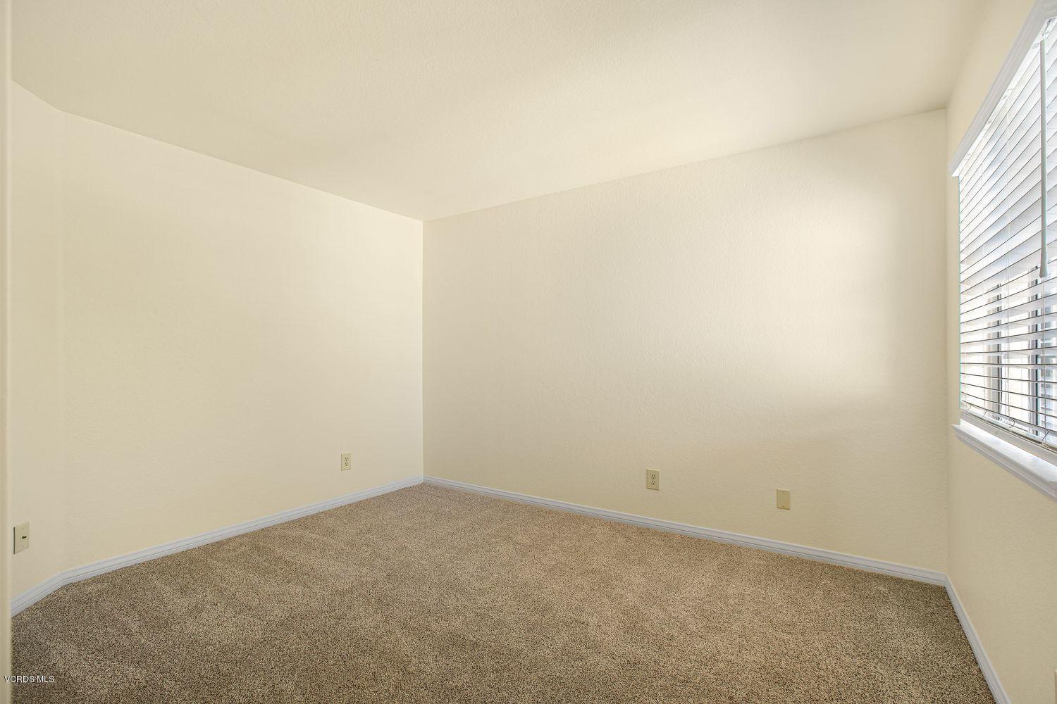 2188 Eastridge Loop Oxnard, CA 93036 - Photo 17 of 27 a view of an empty room and a window