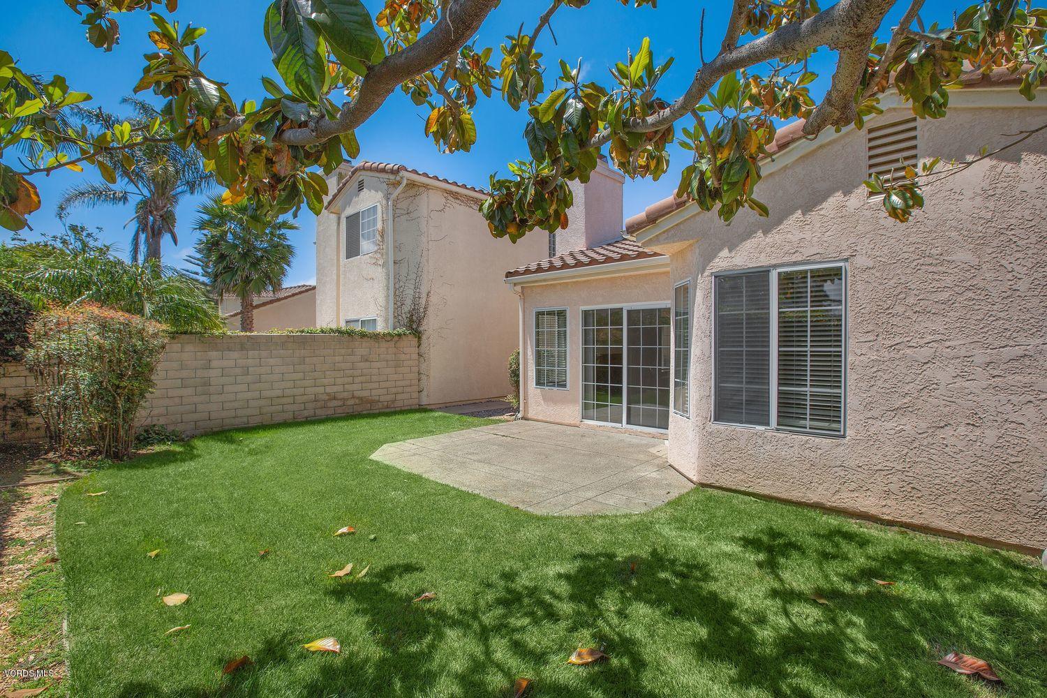 2188 Eastridge Loop Oxnard, CA 93036 - Photo 24 of 27 a view of house with backyard