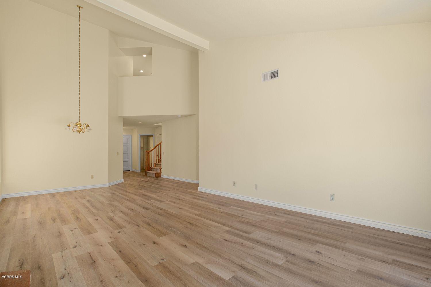 2188 Eastridge Loop Oxnard, CA 93036 - Photo 7 of 27 a view of empty room with wooden floor