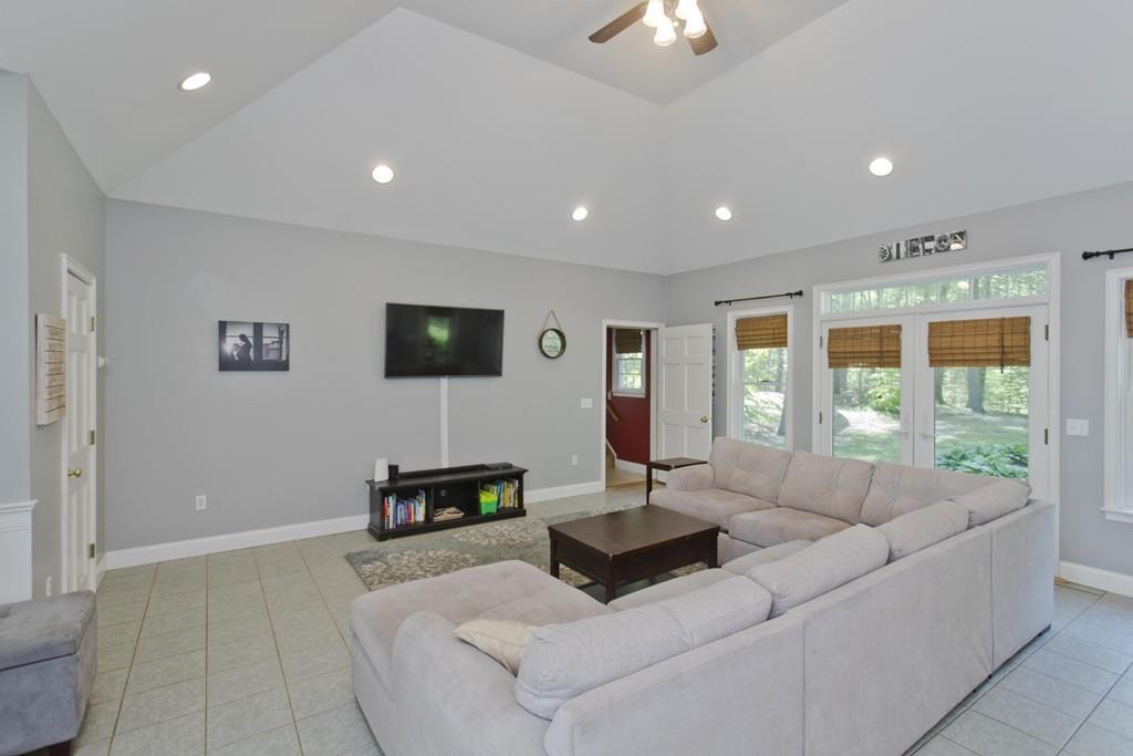 201 Plumtree Road Sunderland, MA 01375 - Photo 15 of 38 a living room with furniture and a flat screen tv