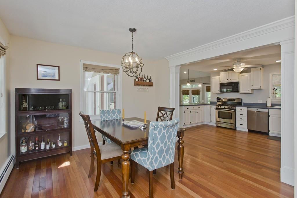 201 Plumtree Road Sunderland, MA 01375 - Photo 19 of 38 a view of a dining room with furniture and wooden floor