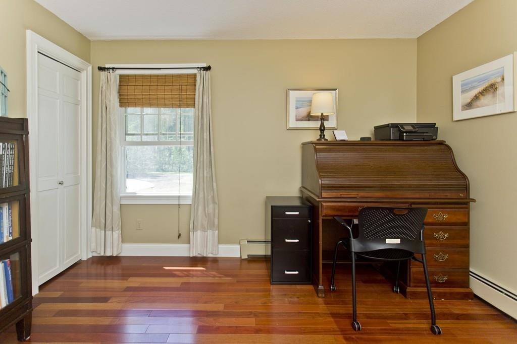 201 Plumtree Road Sunderland, MA 01375 - Photo 26 of 38 a living room with a bed and a window