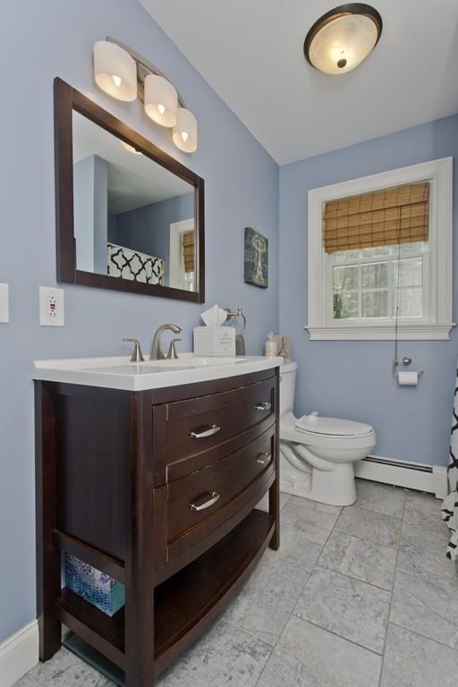 201 Plumtree Road Sunderland, MA 01375 - Photo 27 of 38 a bathroom with a toilet a sink and mirror