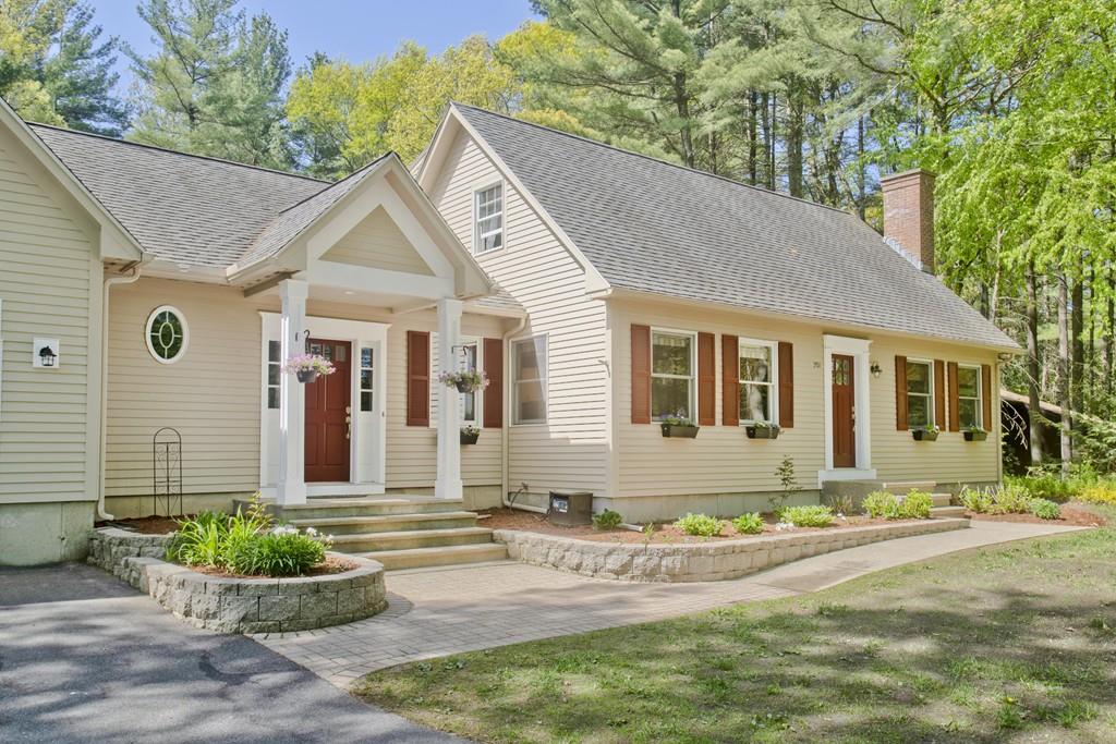 201 Plumtree Road Sunderland, MA 01375 - Photo 3 of 38 a front view of a house with garden