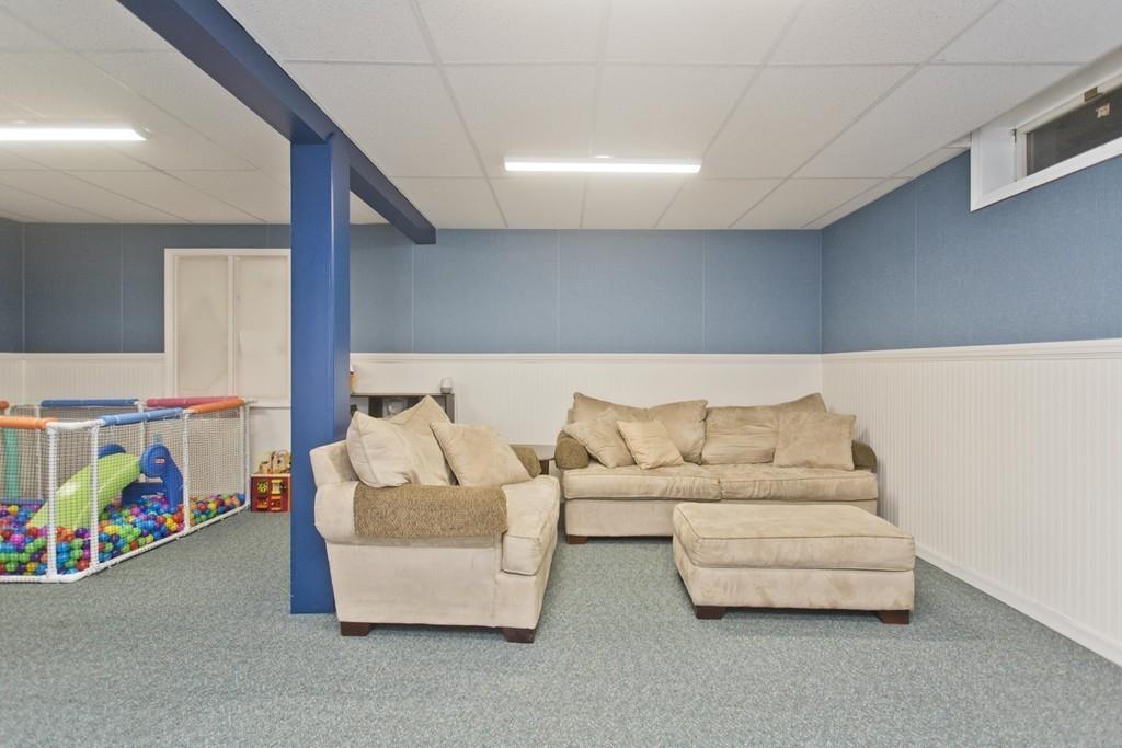 201 Plumtree Road Sunderland, MA 01375 - Photo 37 of 38 a living room with furniture and a couch