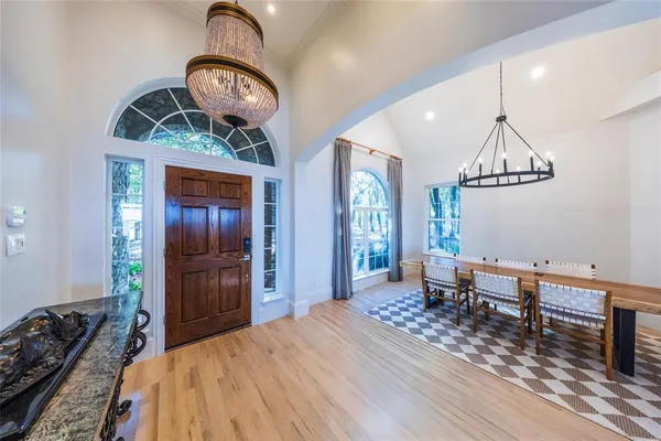 a bedroom with bed and a window