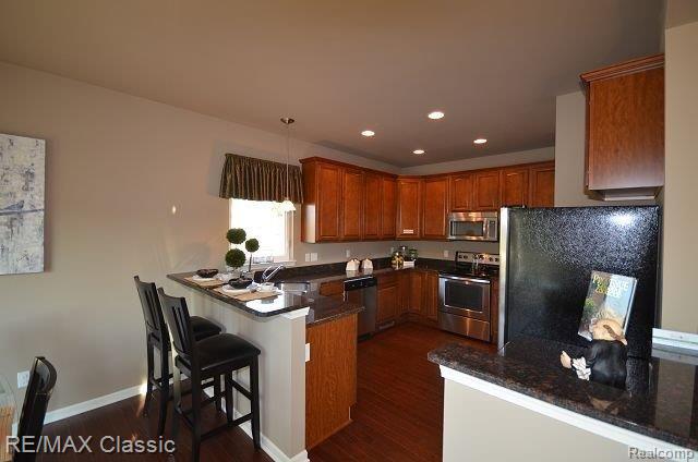 49368 Hawksburry Road, Unit 16 Canton, MI 48188 - Photo 13 of 18 Kitchen