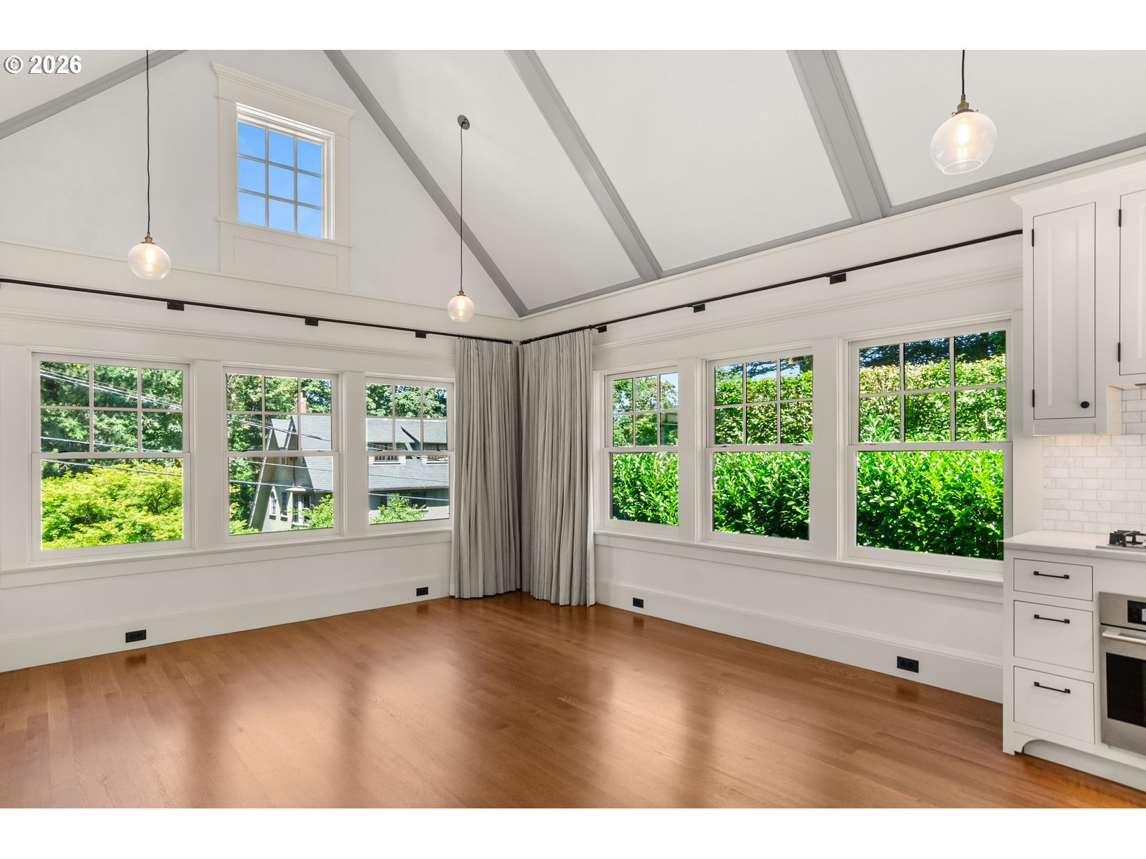 2023 Southwest Montgomery Drive Portland, OR 97201 - Photo 11 of 46 a view of an empty room with a window