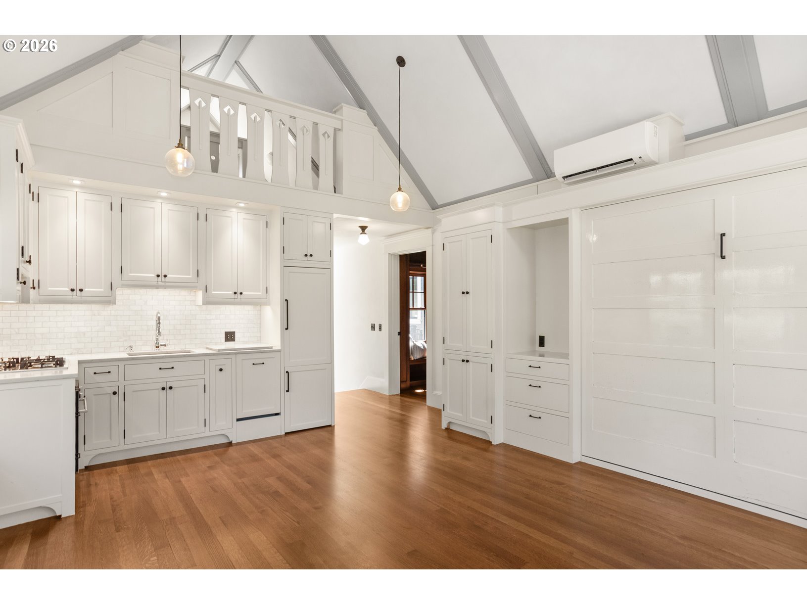 2023 Southwest Montgomery Drive Portland, OR 97201 - Photo 13 of 46 a view of a kitchen with wooden floor