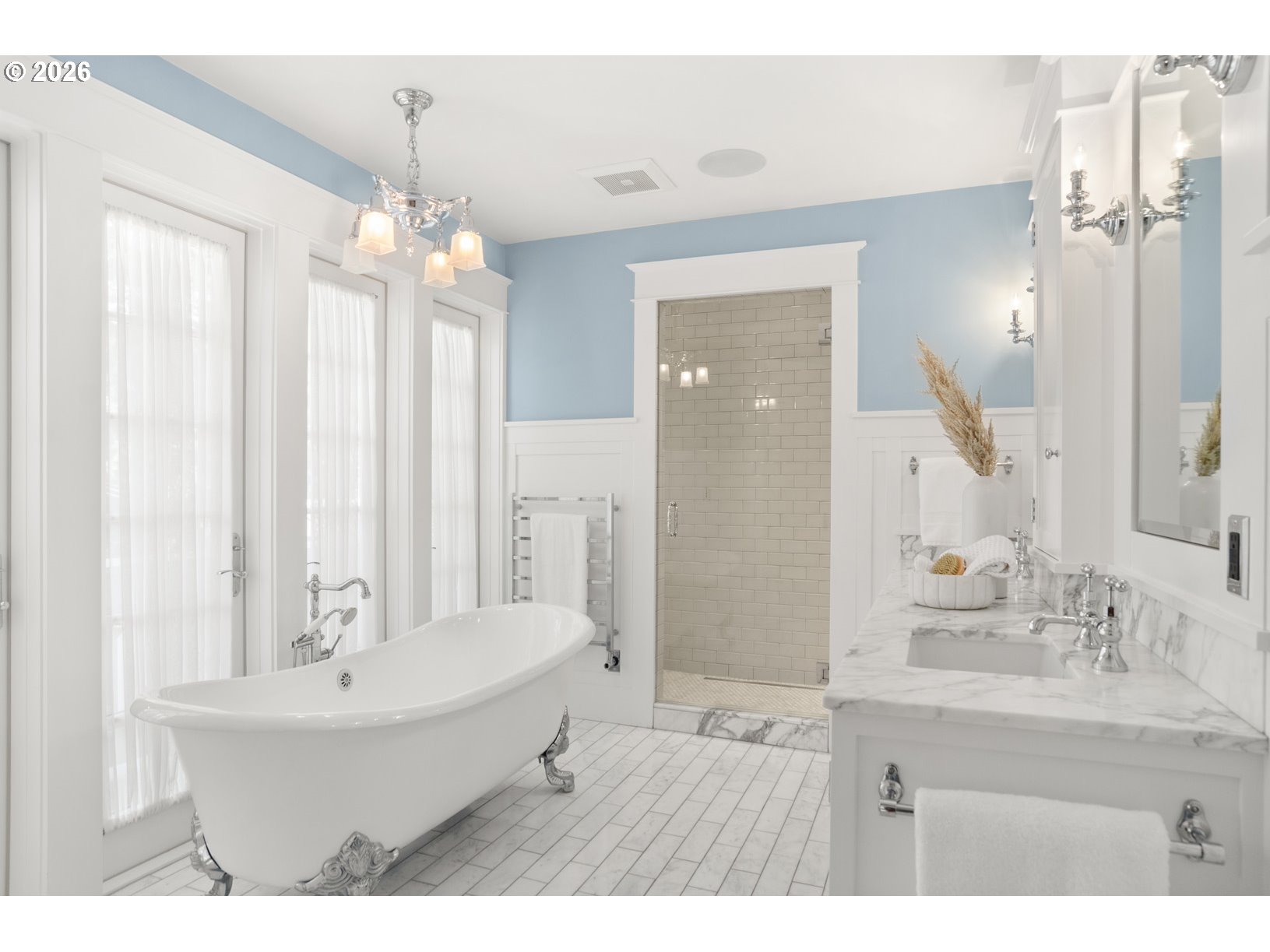 2023 Southwest Montgomery Drive Portland, OR 97201 - Photo 19 of 46 a bathroom with a bathtub a sink and a mirror