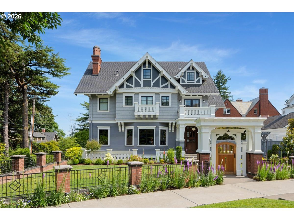 2023 Southwest Montgomery Drive Portland, OR 97201 - Photo 32 of 46 a front view of a house with a yard