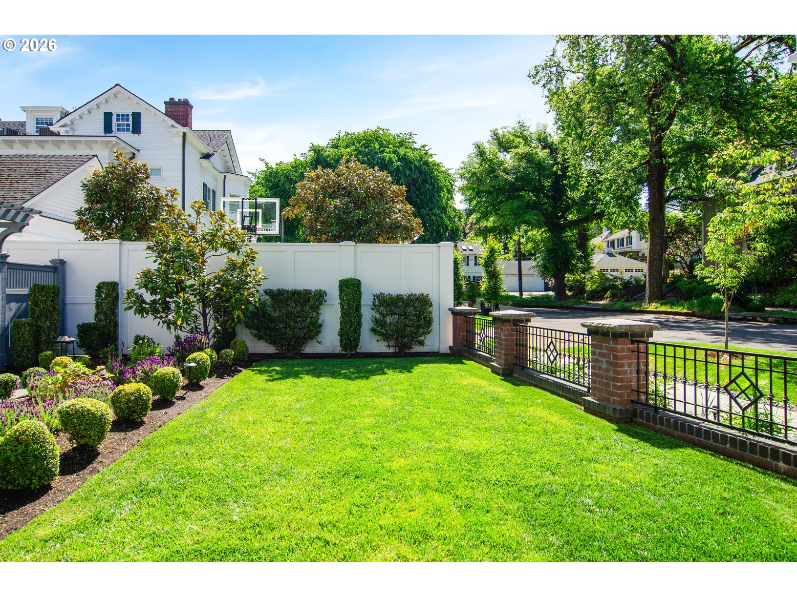 2023 Southwest Montgomery Drive Portland, OR 97201 - Photo 36 of 46 a view of a house with backyard and a garden