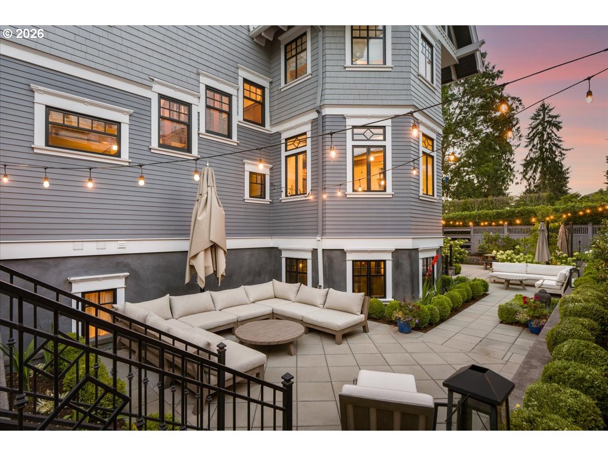 2023 Southwest Montgomery Drive Portland, OR 97201 - Photo 39 of 46 a view of house with a chairs and table in a patio