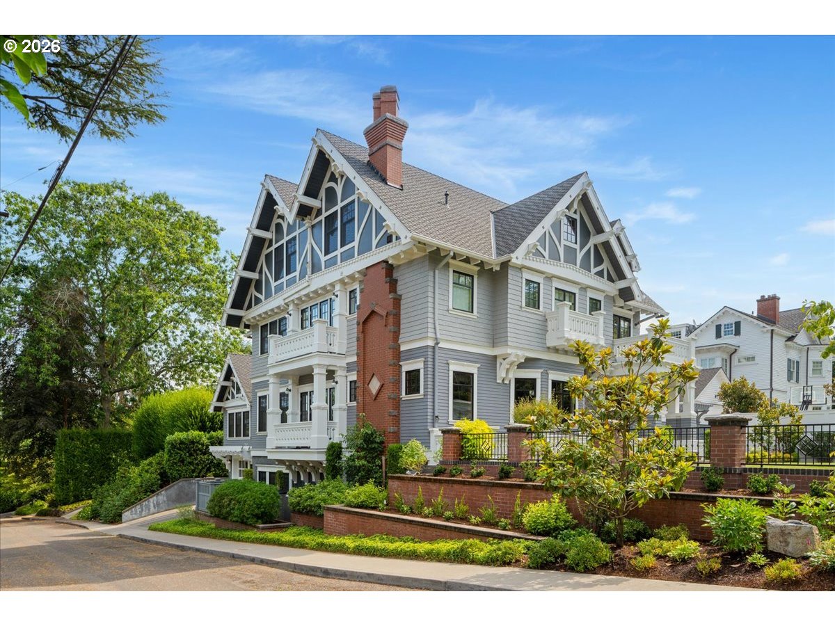 2023 Southwest Montgomery Drive Portland, OR 97201 - Photo 43 of 46 a front view of a house with a yard