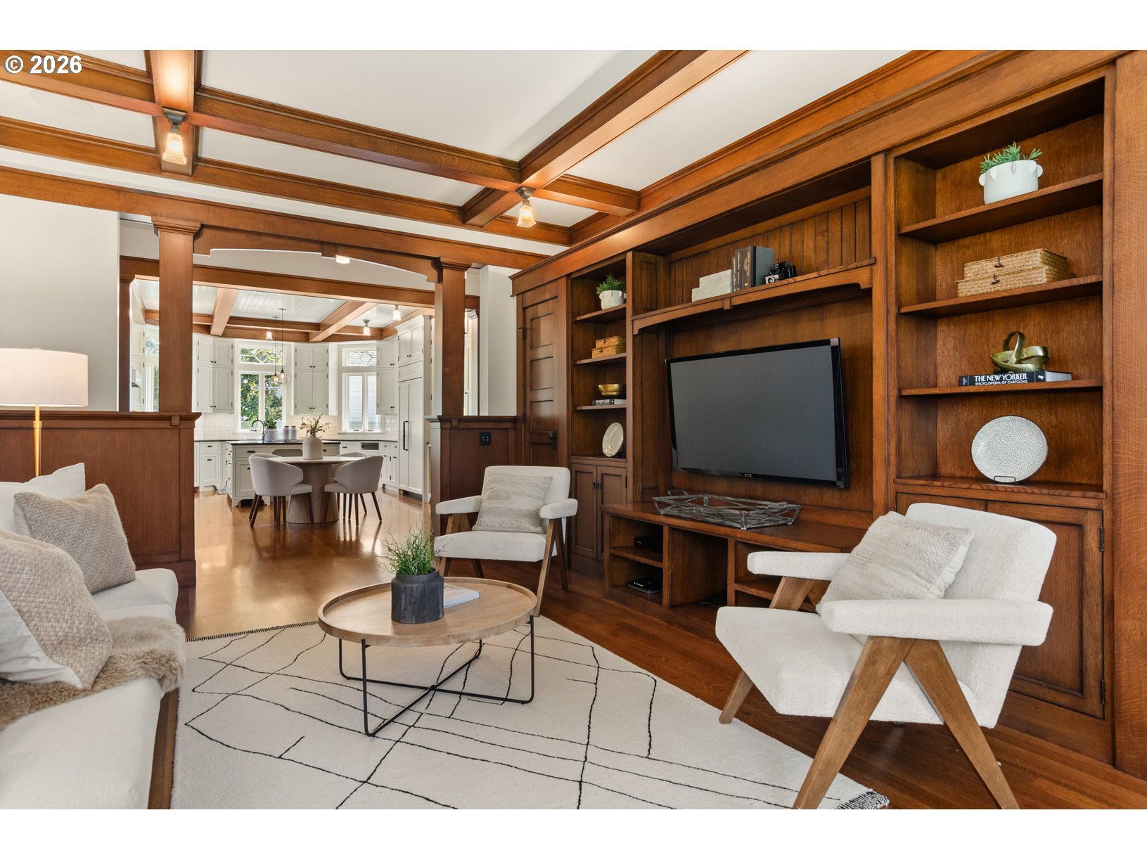 2023 Southwest Montgomery Drive Portland, OR 97201 - Photo 10 of 46 a living room with furniture a flat screen tv and a floor to ceiling window