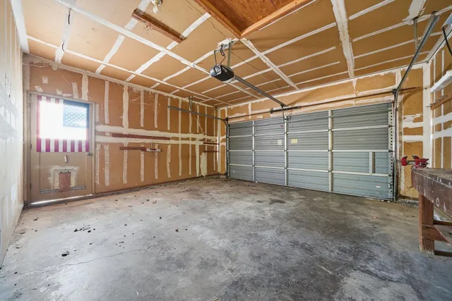 a view of a room with storage and utility room
