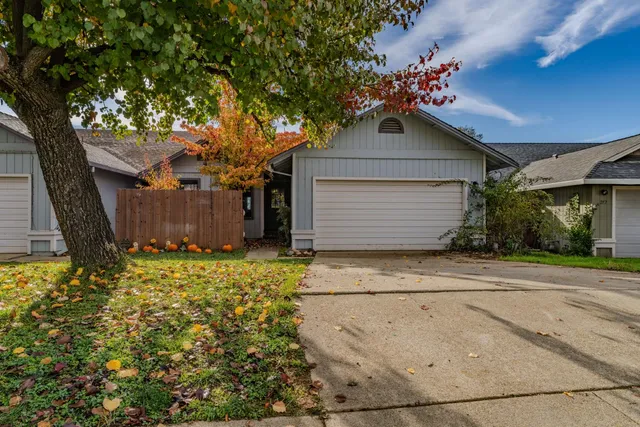 front view of a house with a garage