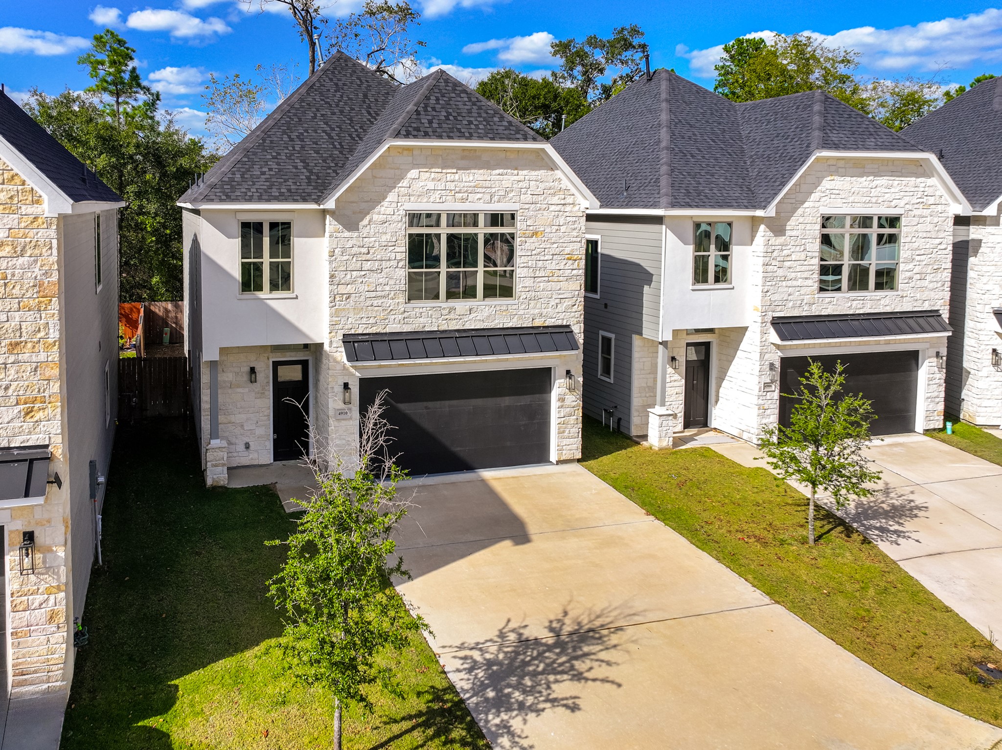 4910 Wunder Way Houston, TX 77069 - Photo 3 of 49 a front view of a house with a yard