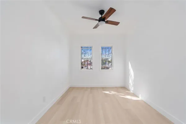 a view of a big room with wooden floor