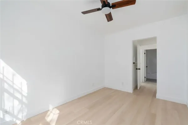 a view of a room with a wardrobe space