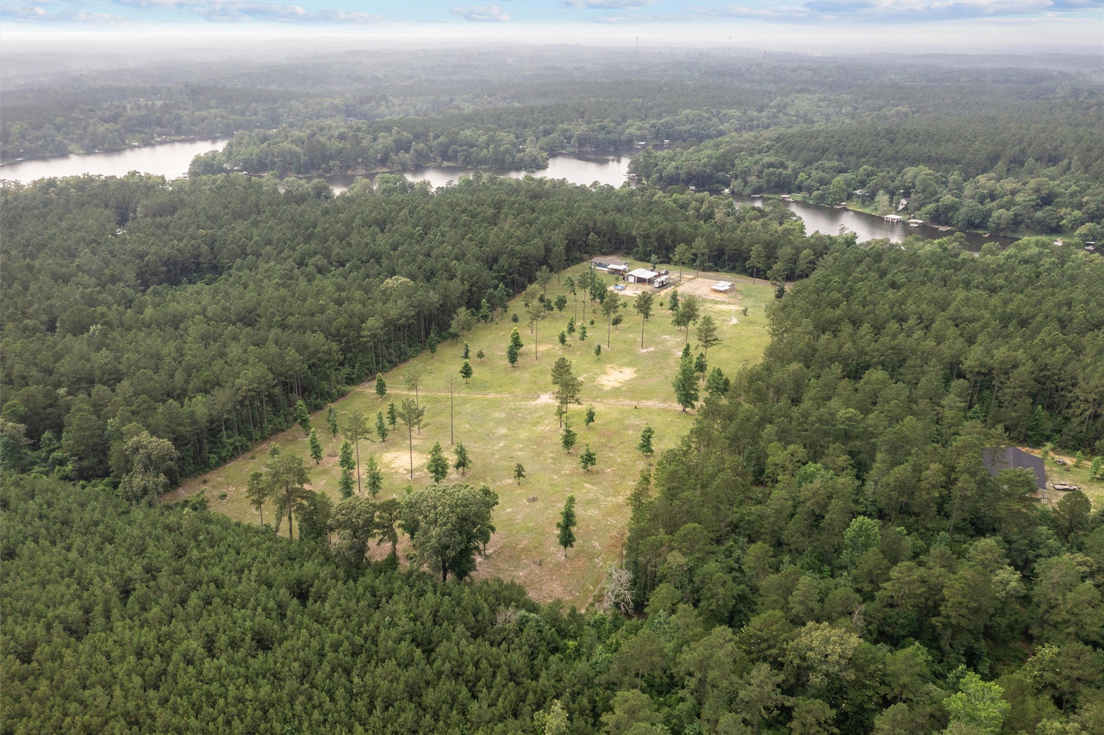 275 County Road 3215 Colmesneil, TX 75938 - Photo 26 of 34 an aerial view of houses with yard